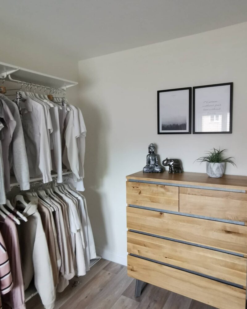 Boston chest of drawers with natural oak and metal detailing used in a dressing room.