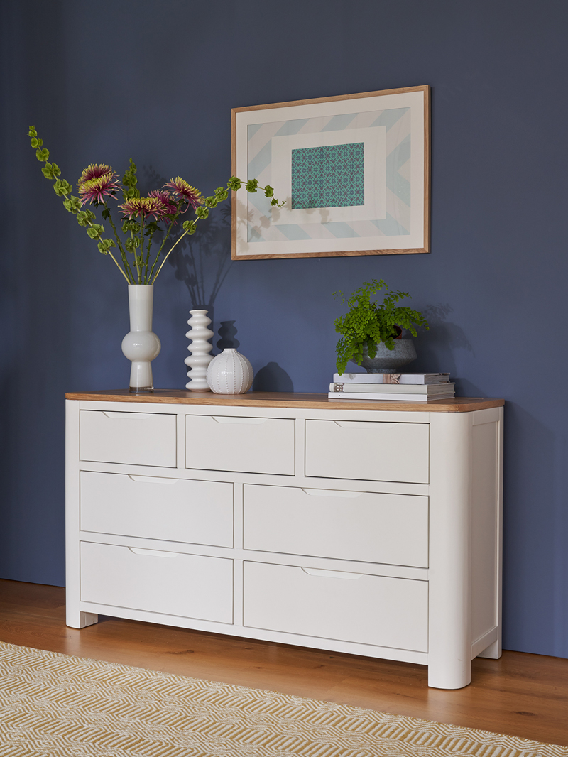 White chest of drawers with white accessories