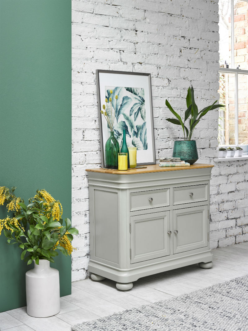 sage green painted sideboard in urban kitchen