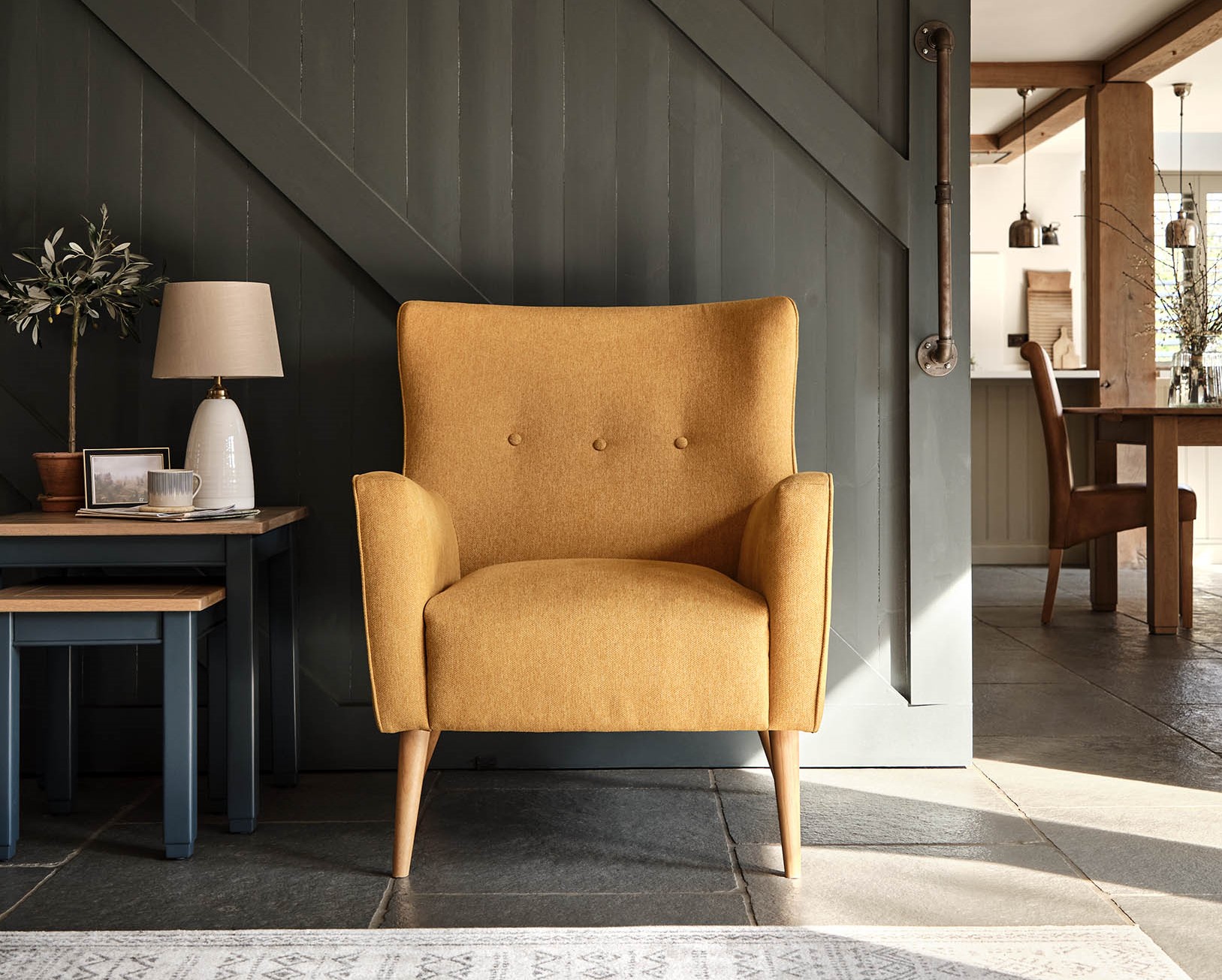 A chair and side table-living room furniture-nest of tables-mustard accent chair-open plan living