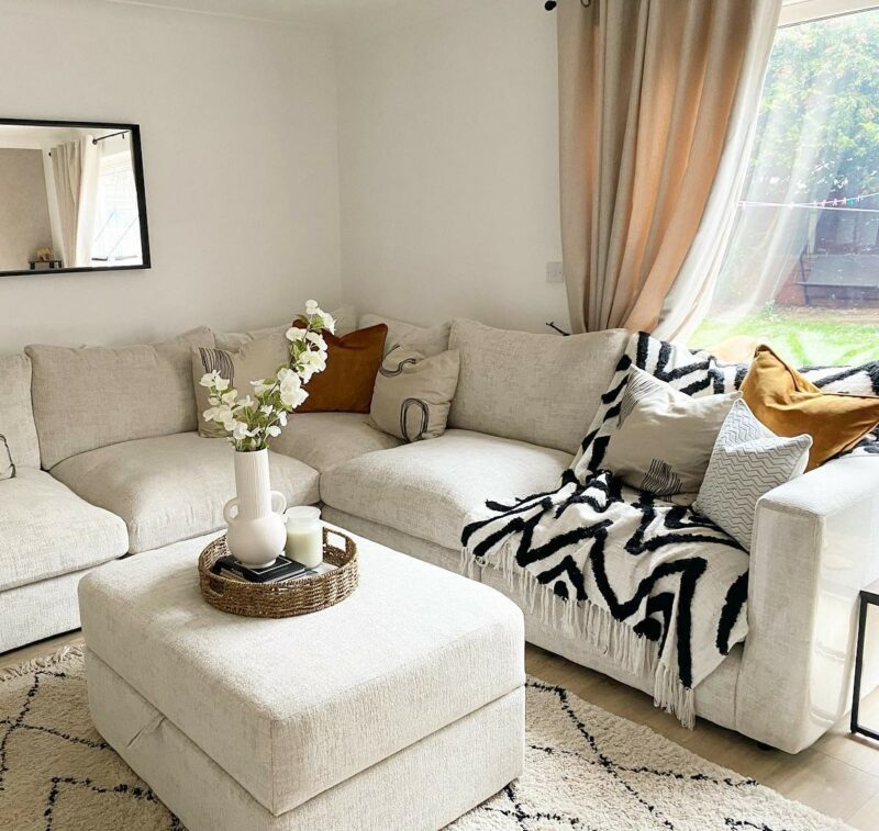 A corner sofa and footstool-living room furniture-cream corner sofa-matching storage footstool