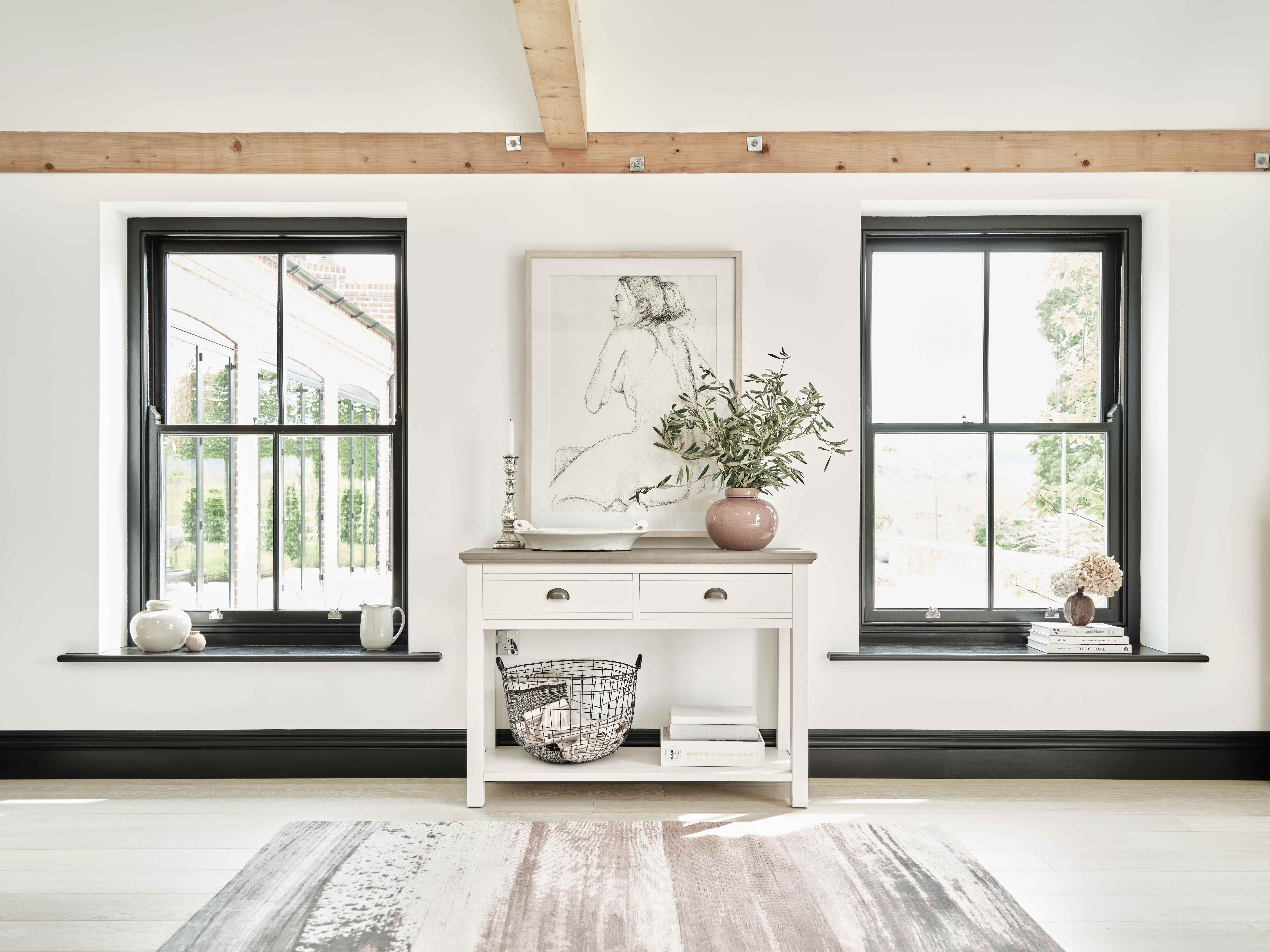 Oak Furnitureland white painted Brompton farmhouse-style console table.