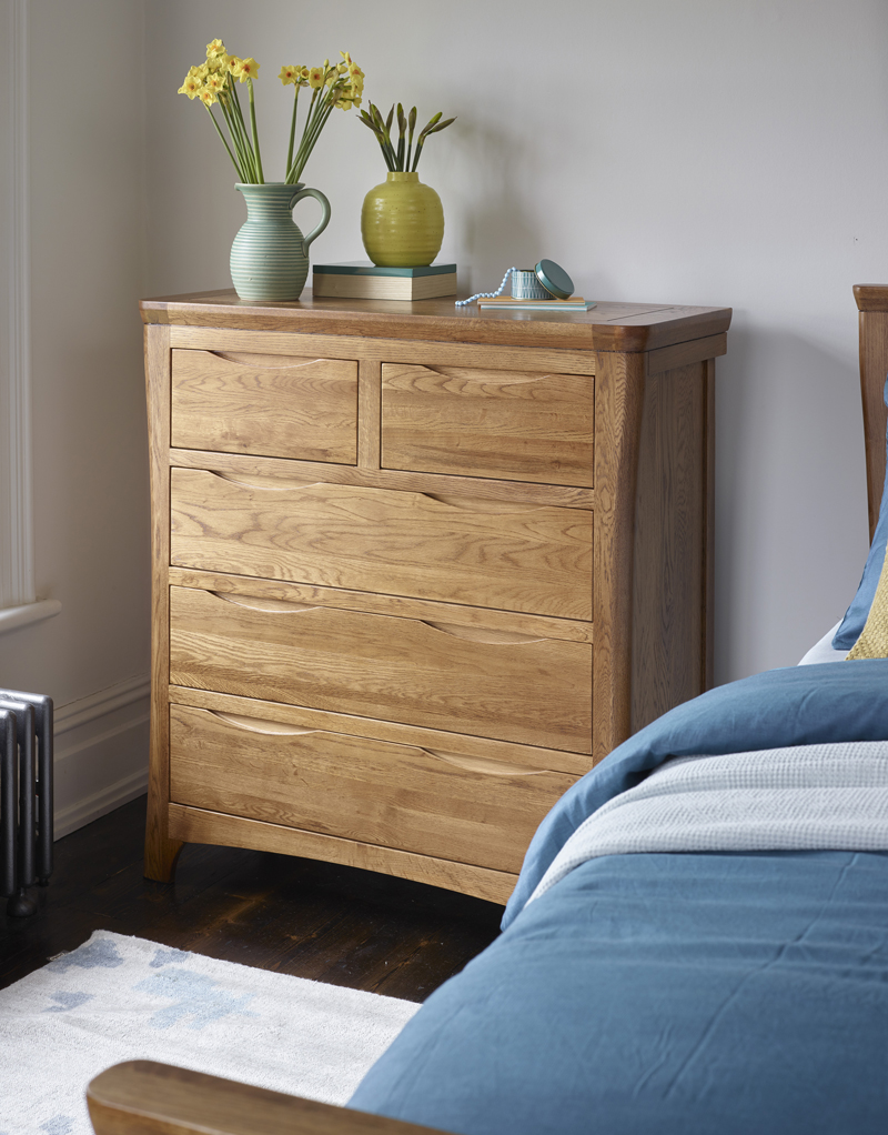 chest of drawers with curved edges