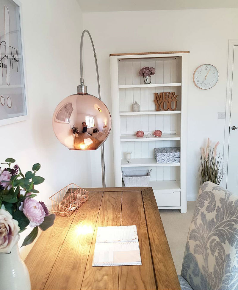 White modern office furniture with rose gold accessories